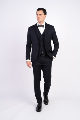 Tmavě modrý vlněný oblek s vestou V přiléhavém střihu Tmavě modrý vlněný oblek s vestou V přiléhavém střihu