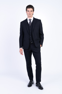 Tmavě modrý vlněný oblek V pohodlném střihu Tmavě modrý vlněný oblek V pohodlném střihu